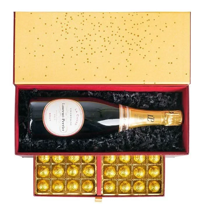 Rote Geschenkbox mit Laurent-Perrier Brut und Pralinen